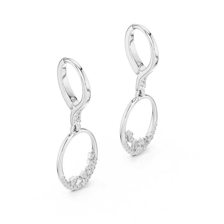 Pair of silver earrings with diamond accents on a white background