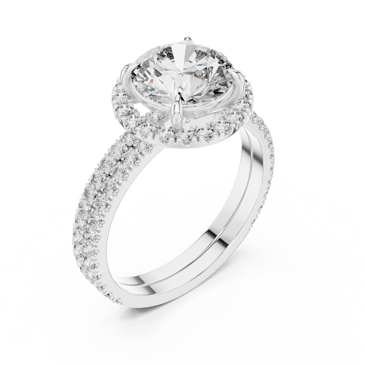 Diamond ring with a large central gemstone and smaller stones on a white background