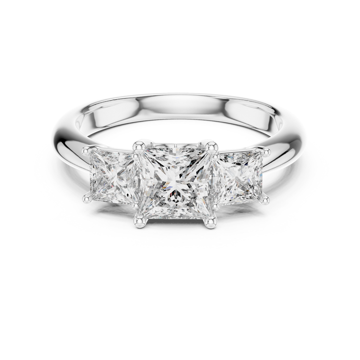 Diamond ring with three-prong setting on a white background