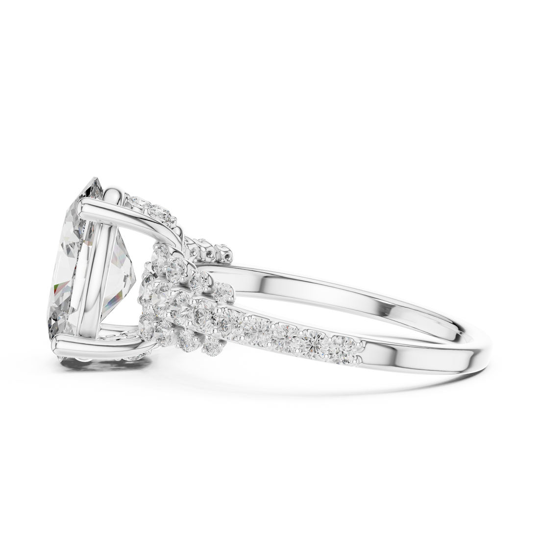 Diamond ring with a large emerald-cut center stone and smaller diamonds on a white background