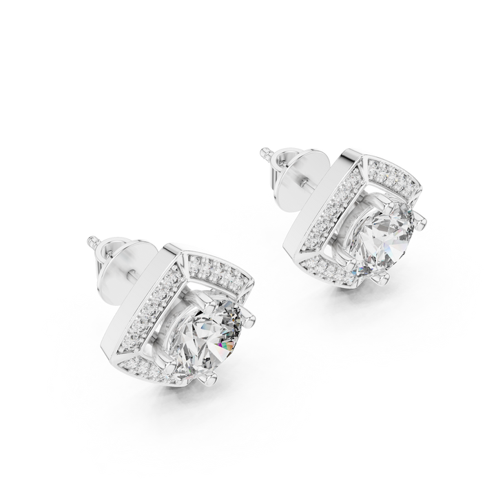 Pair of diamond stud earrings on a white background