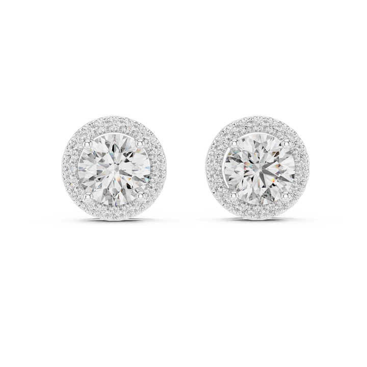 Pair of diamond earrings on a white background