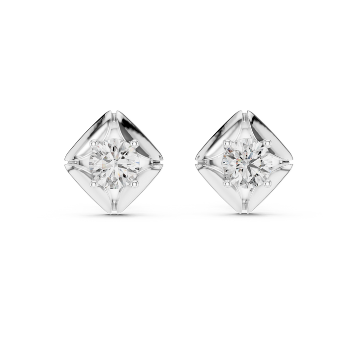 Pair of diamond stud earrings on a white background