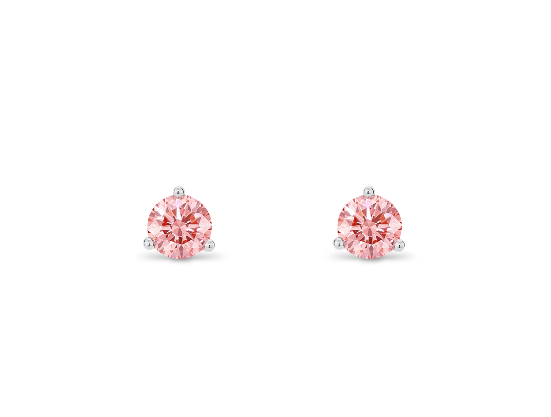 Front view of pink 0.5 carat total weight round brilliant solitaire studs in 14k white gold