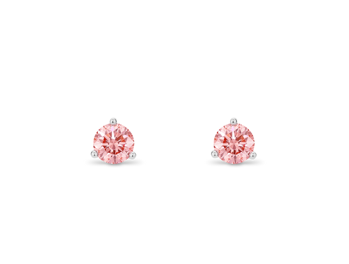 Front view of pink 0.5 carat total weight round brilliant solitaire studs in 14k white gold