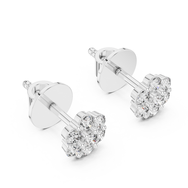 Pair of diamond stud earrings on a white background