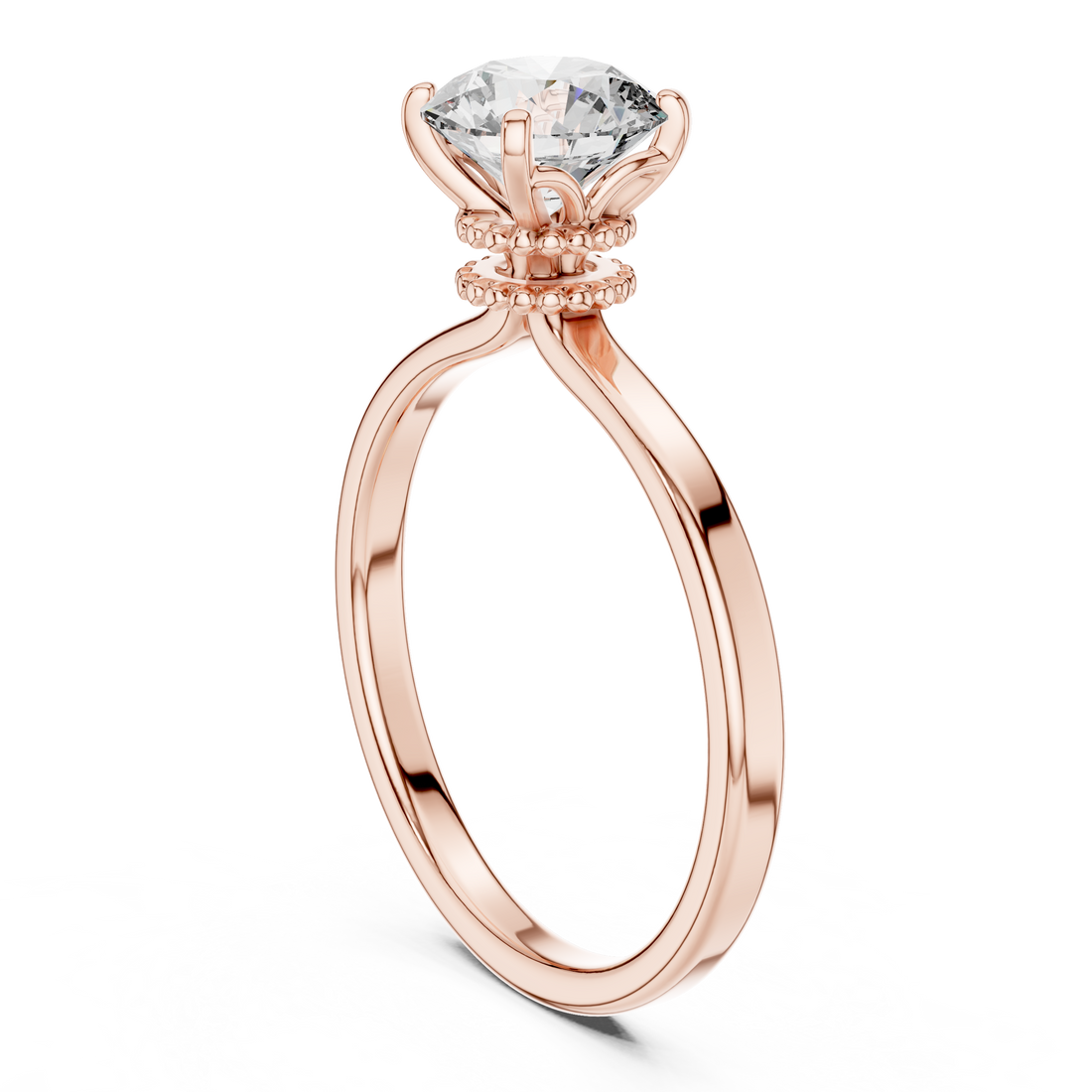 Rose gold ring with a large diamond on a white background