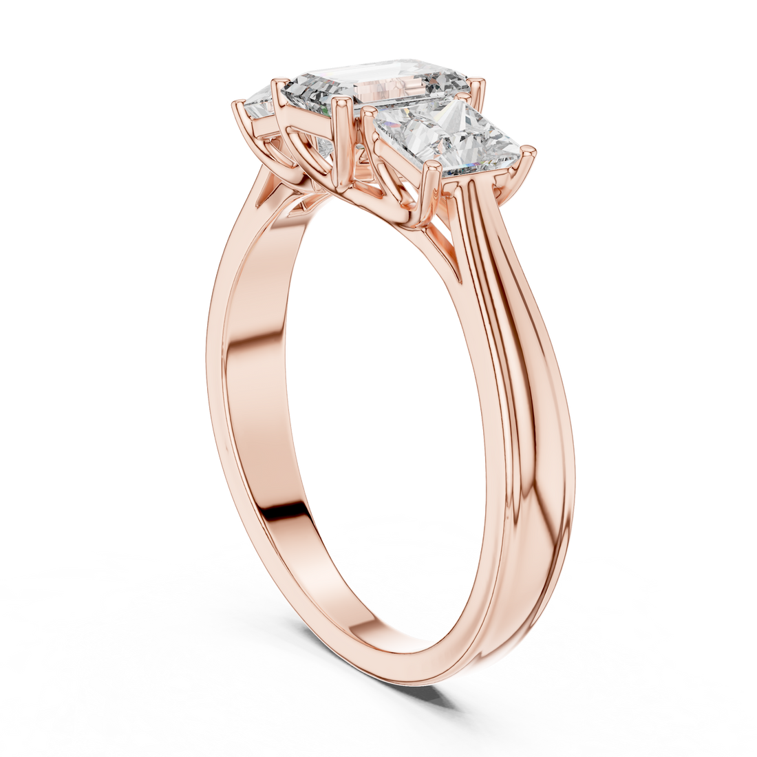 Rose gold ring with three diamond stones on a white background