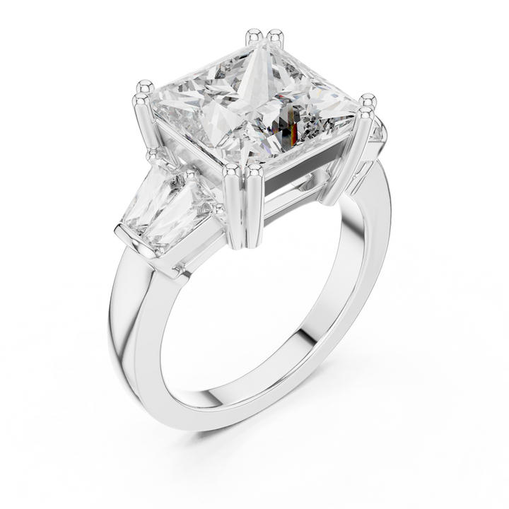Diamond ring with a prominent central diamond and two smaller diamonds on a white background