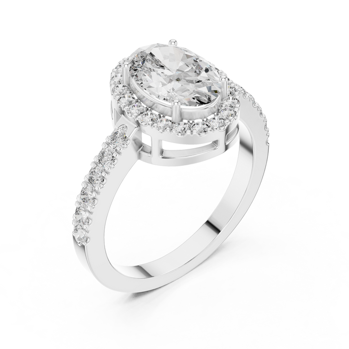 Silver ring with a large central gemstone and smaller stones on a white background