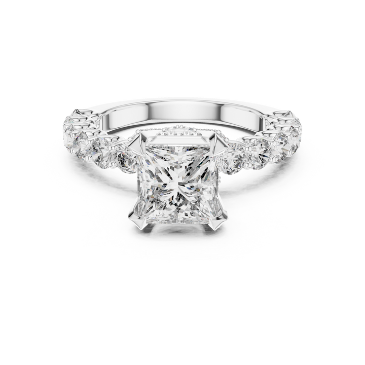 Diamond ring with a white gold band on a white background