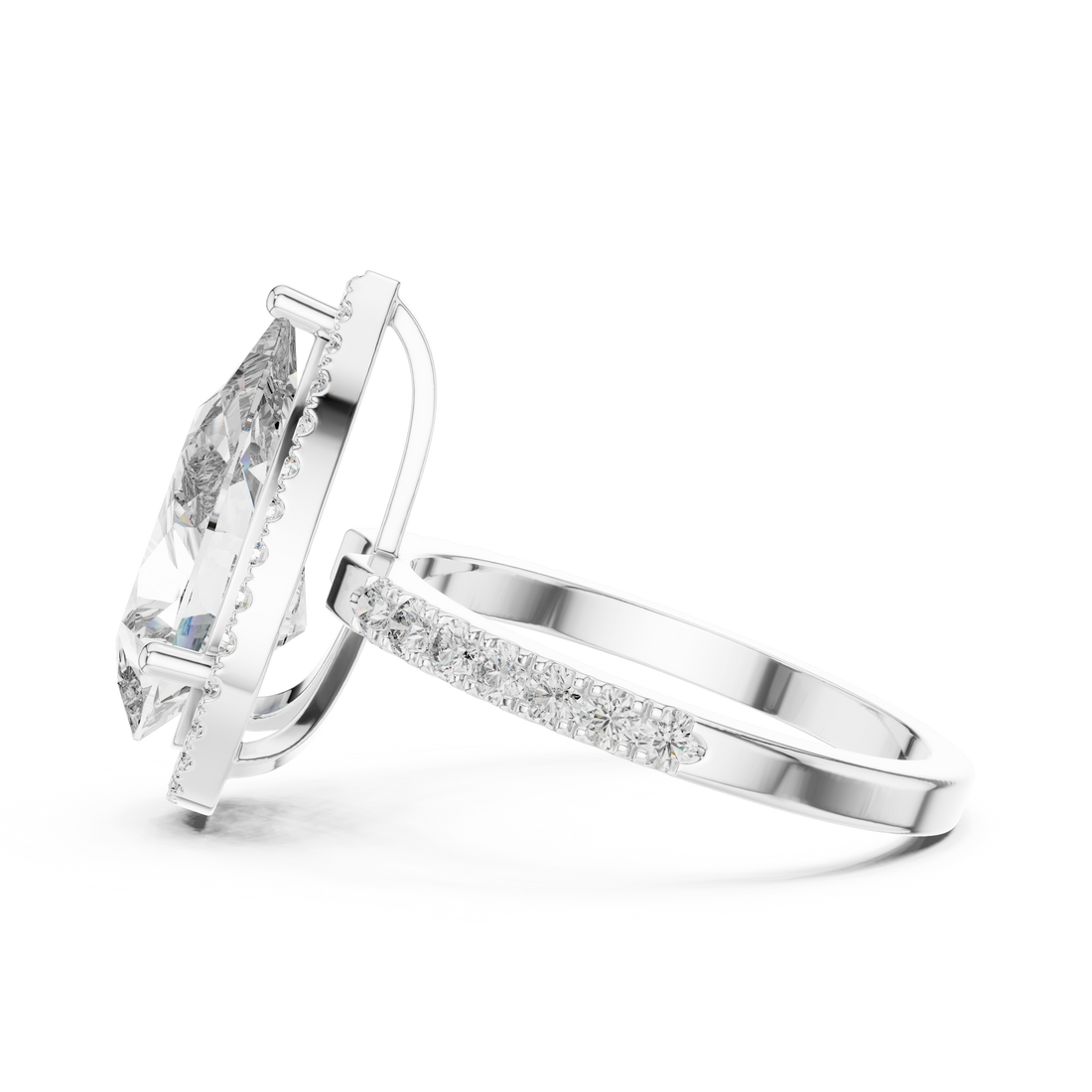Silver ring with a large diamond and smaller diamonds on the band against a white background