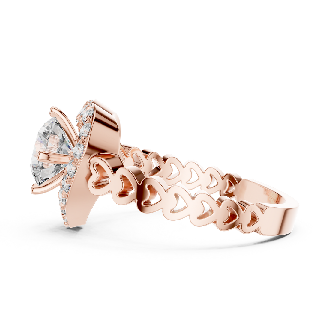 Rose gold ring with heart design and clear gemstone on a white background
