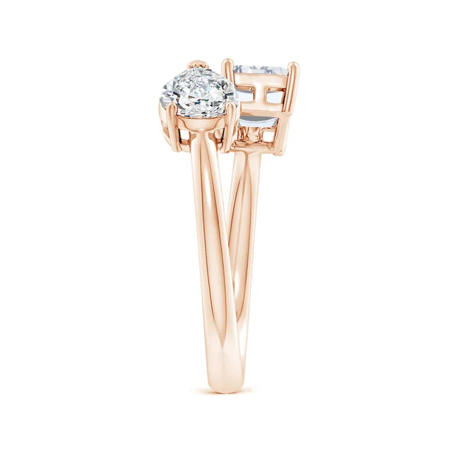 Rose gold ring with a diamond on a white background