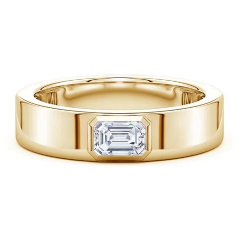 Gold ring with a diamond on a white background