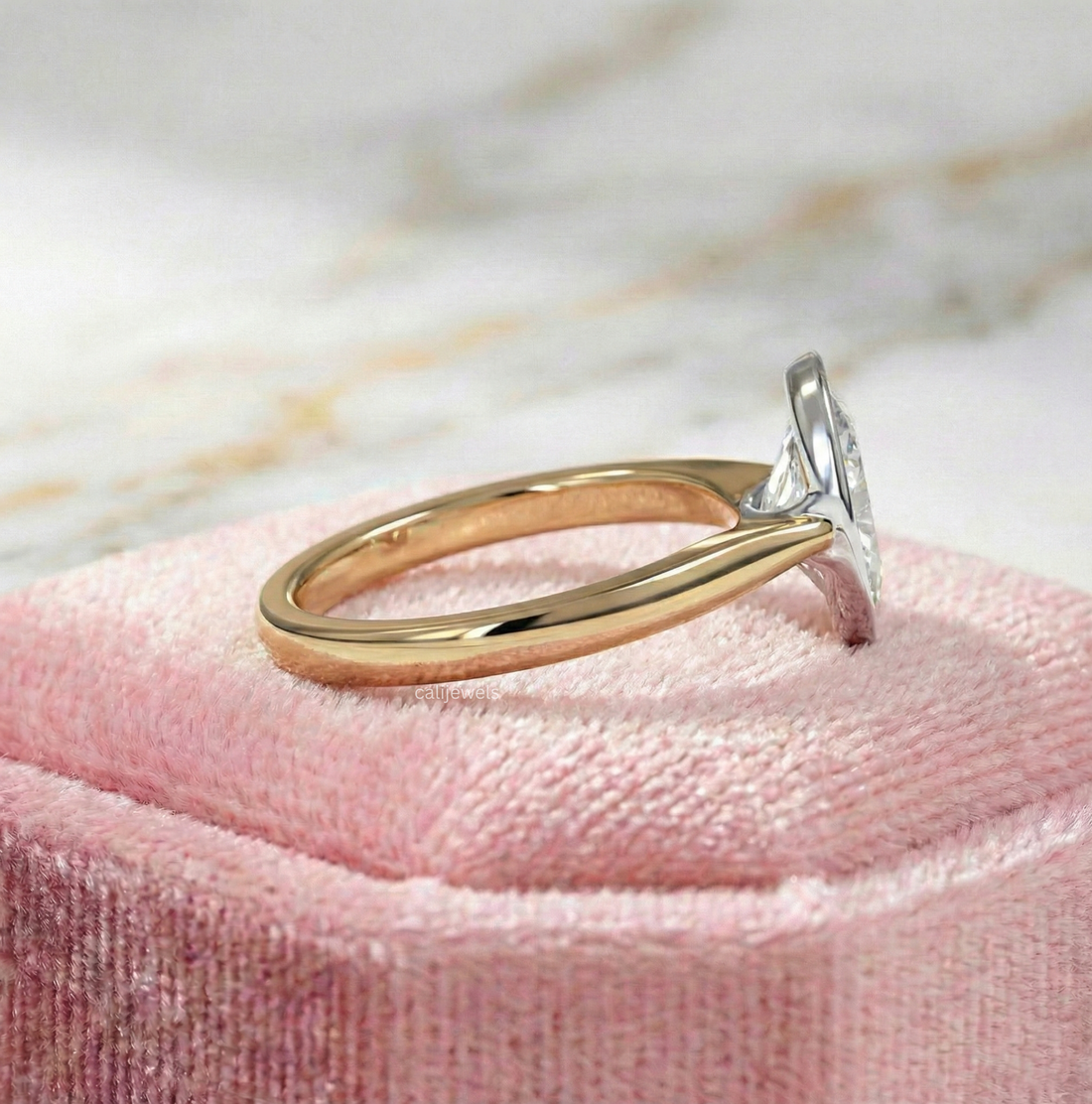 Two Tone Oval Cut Lab Grown Diamond Bezel Set Engagement Ring