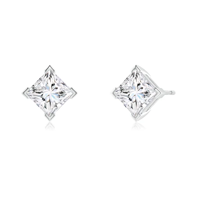 Pair of diamond stud earrings on a white background