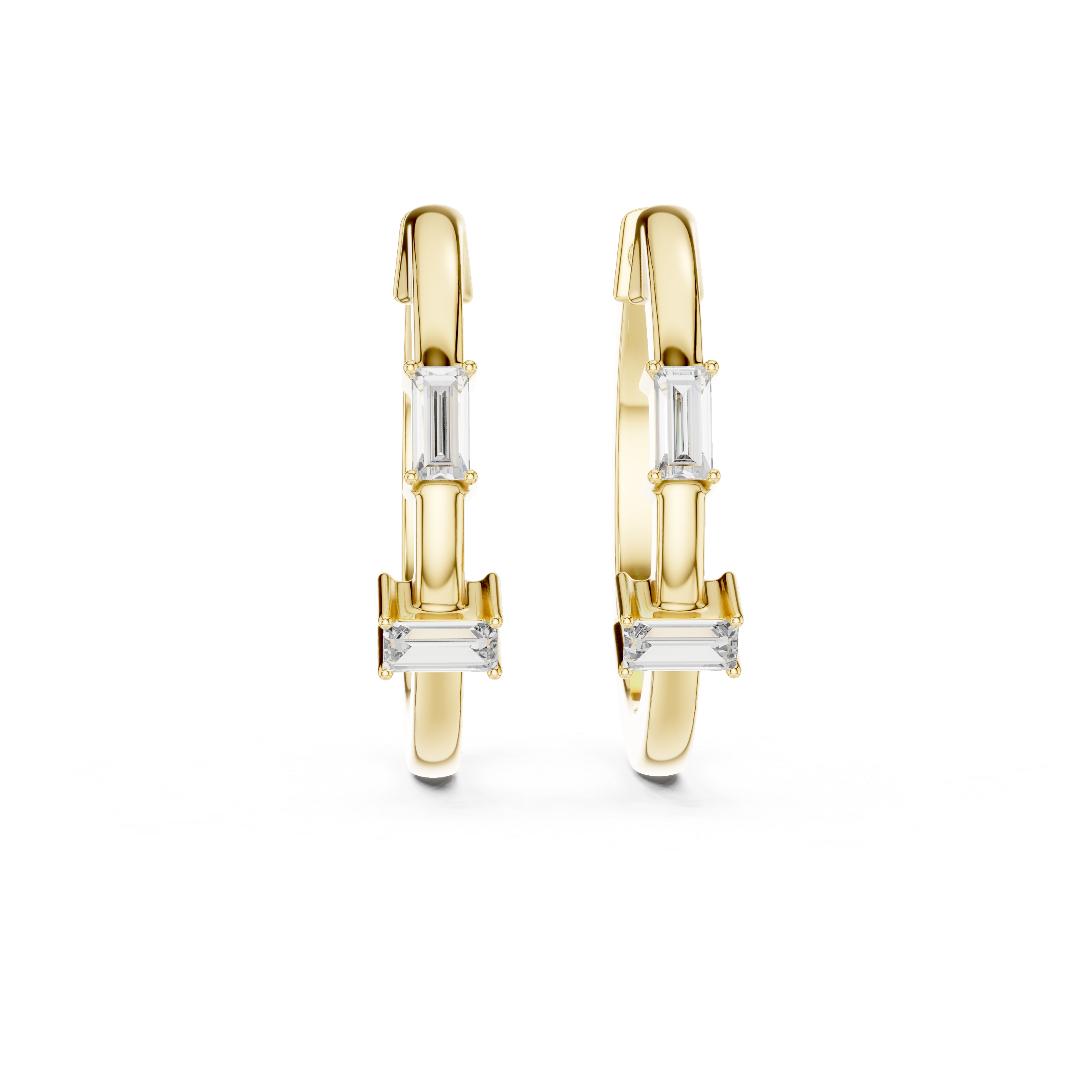 Gold hoop earrings with baguette cut gemstones on a white background