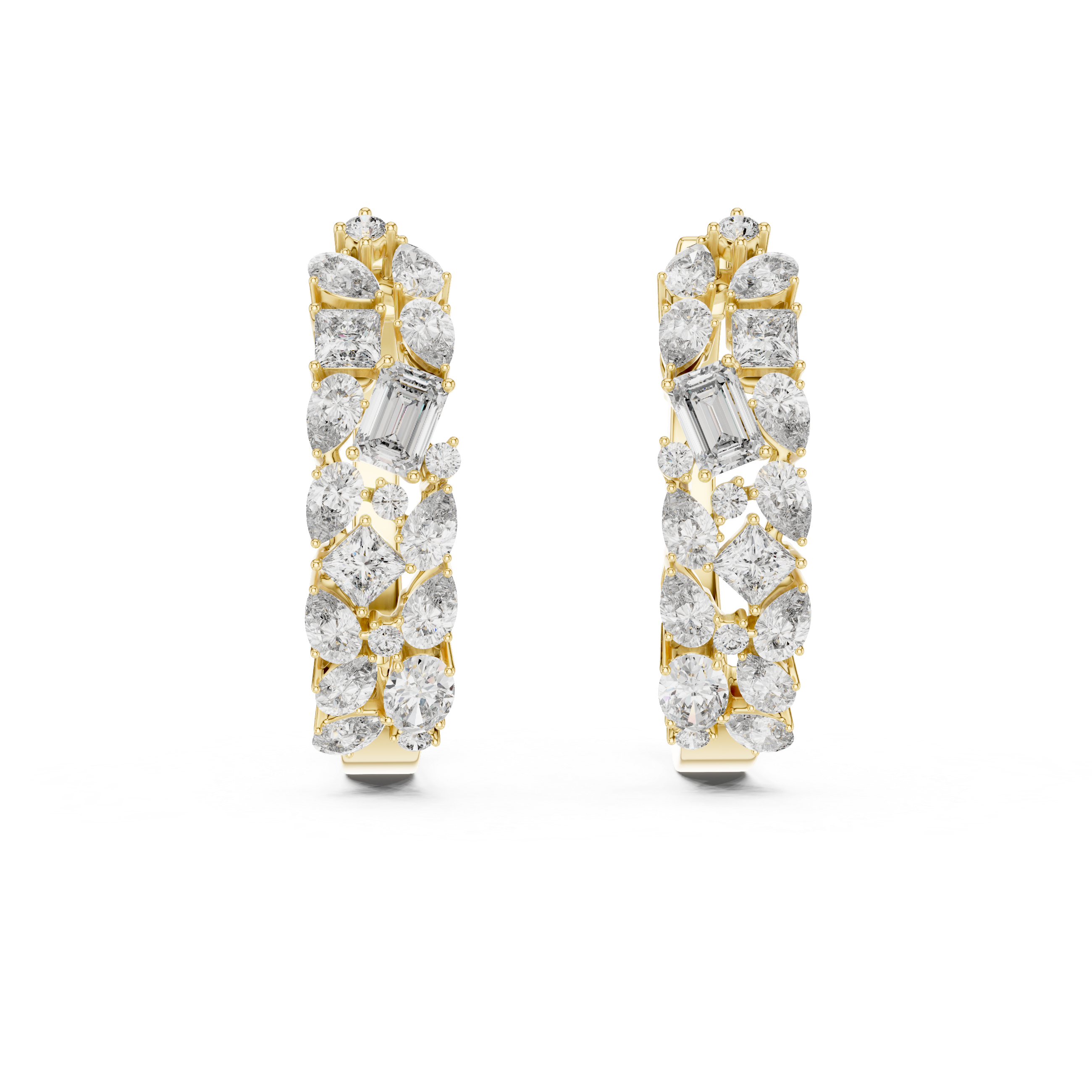 Pair of diamond earrings with gold and silver accents on a white background