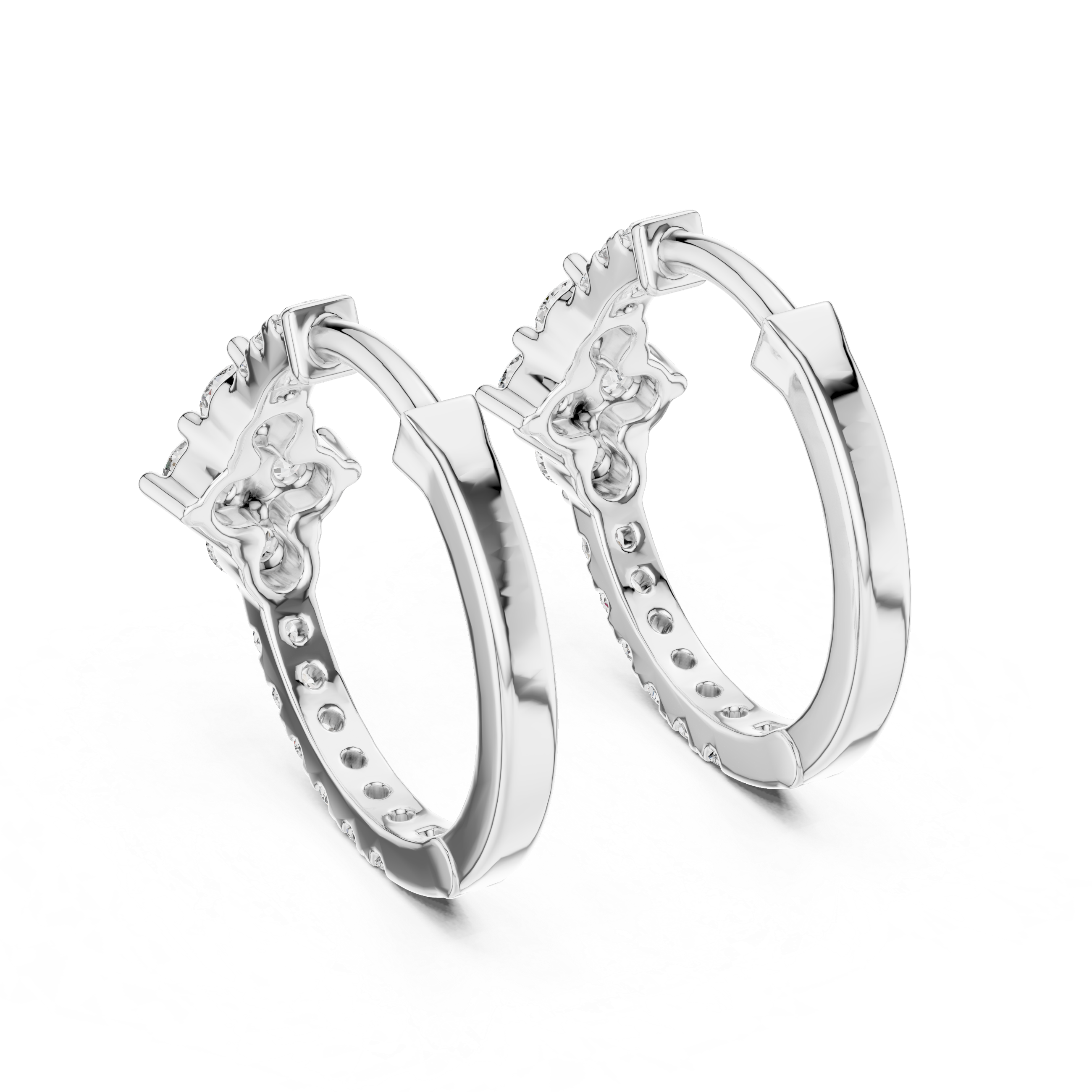 Pair of silver hoop earrings with small diamonds on a white background