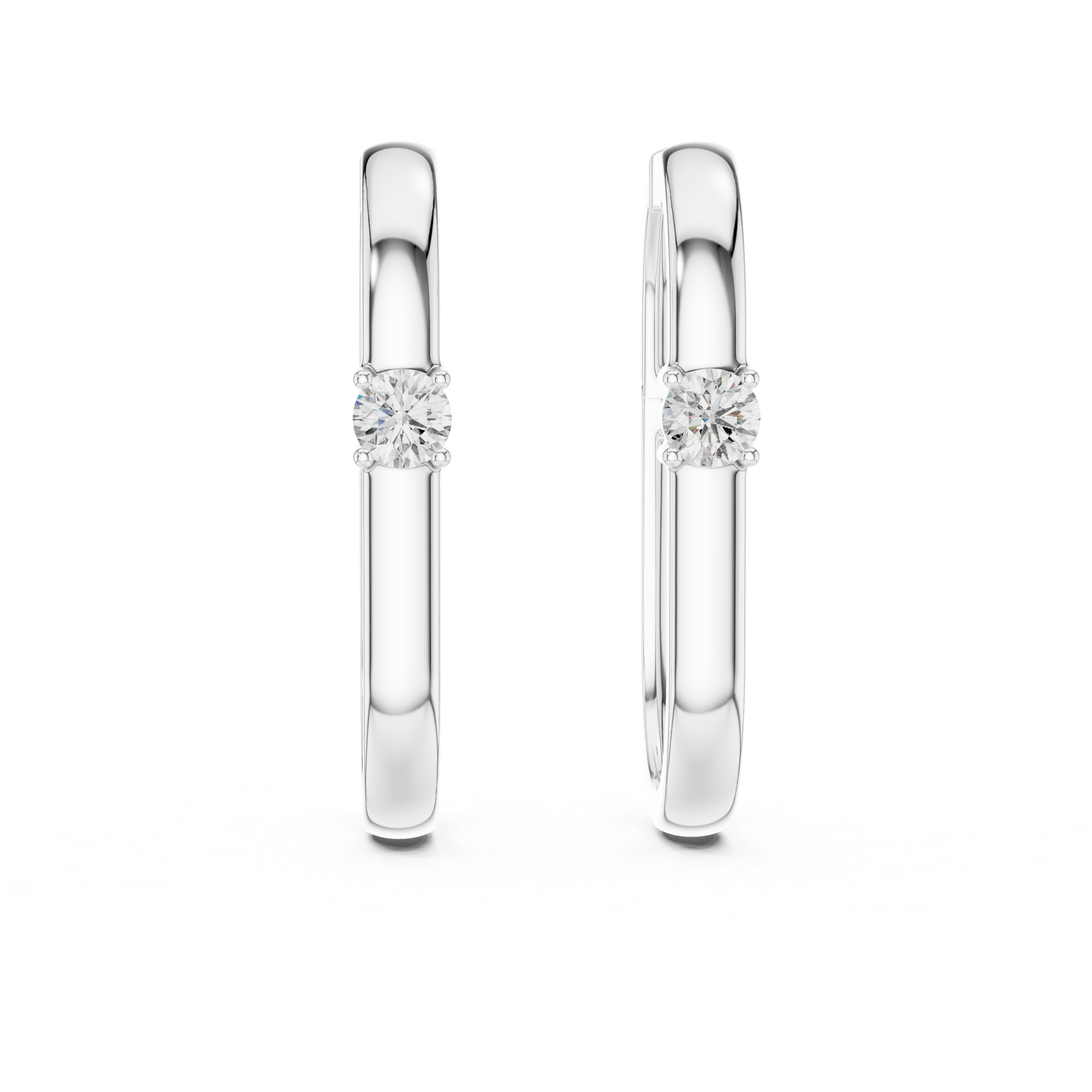 Pair of silver hoop earrings with clear gemstones on a white background