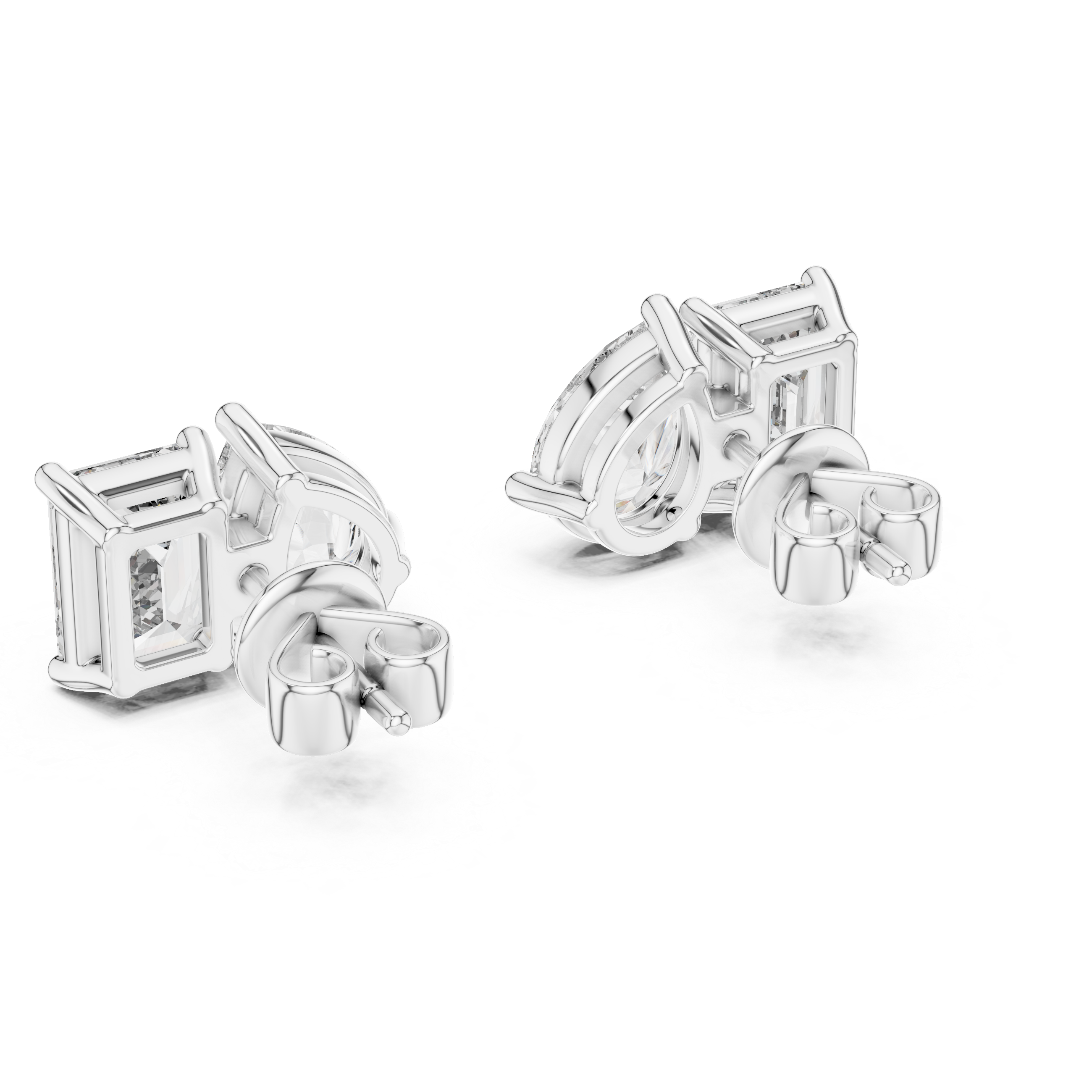 Pair of silver stud earrings on a white background