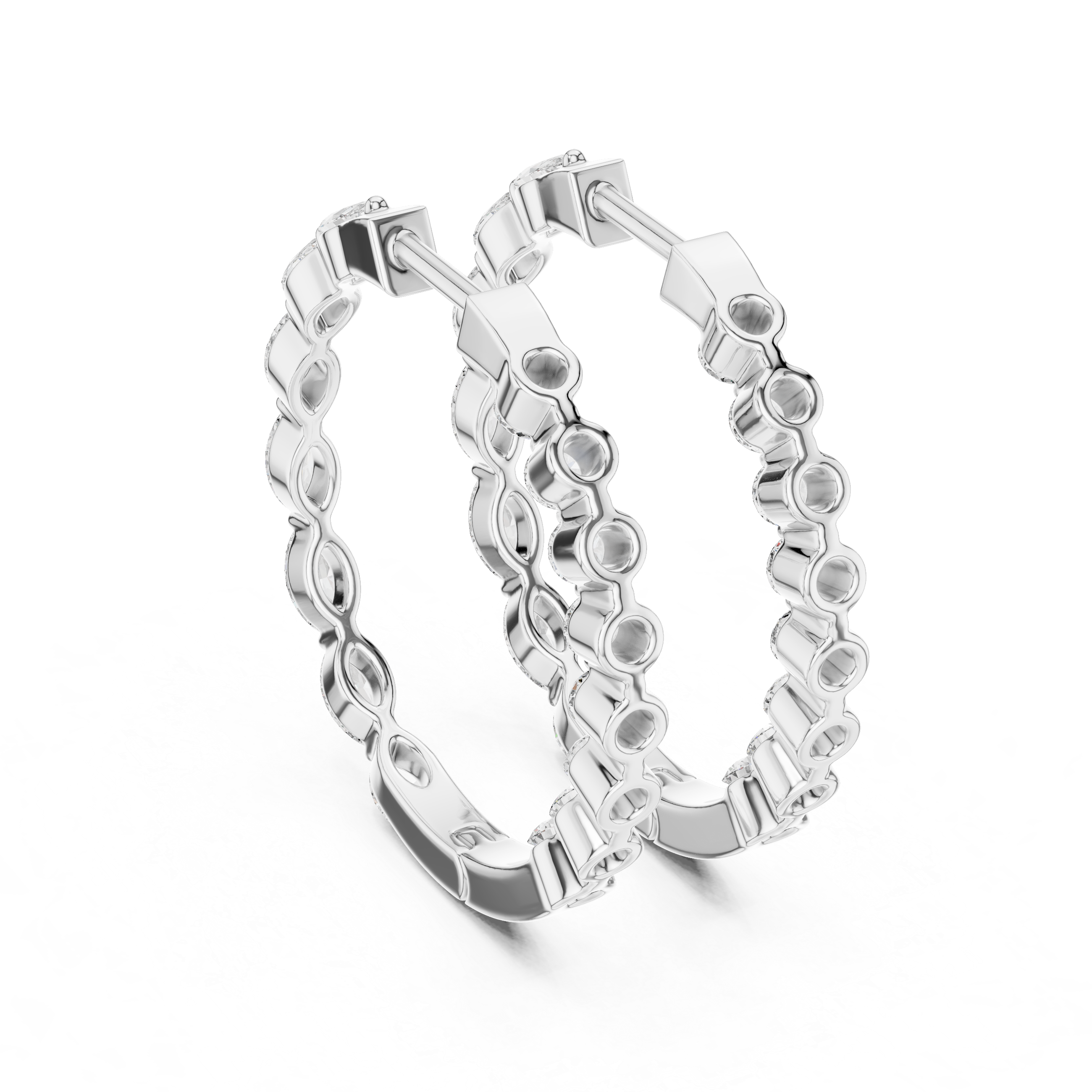Pair of silver hoop earrings on a white background