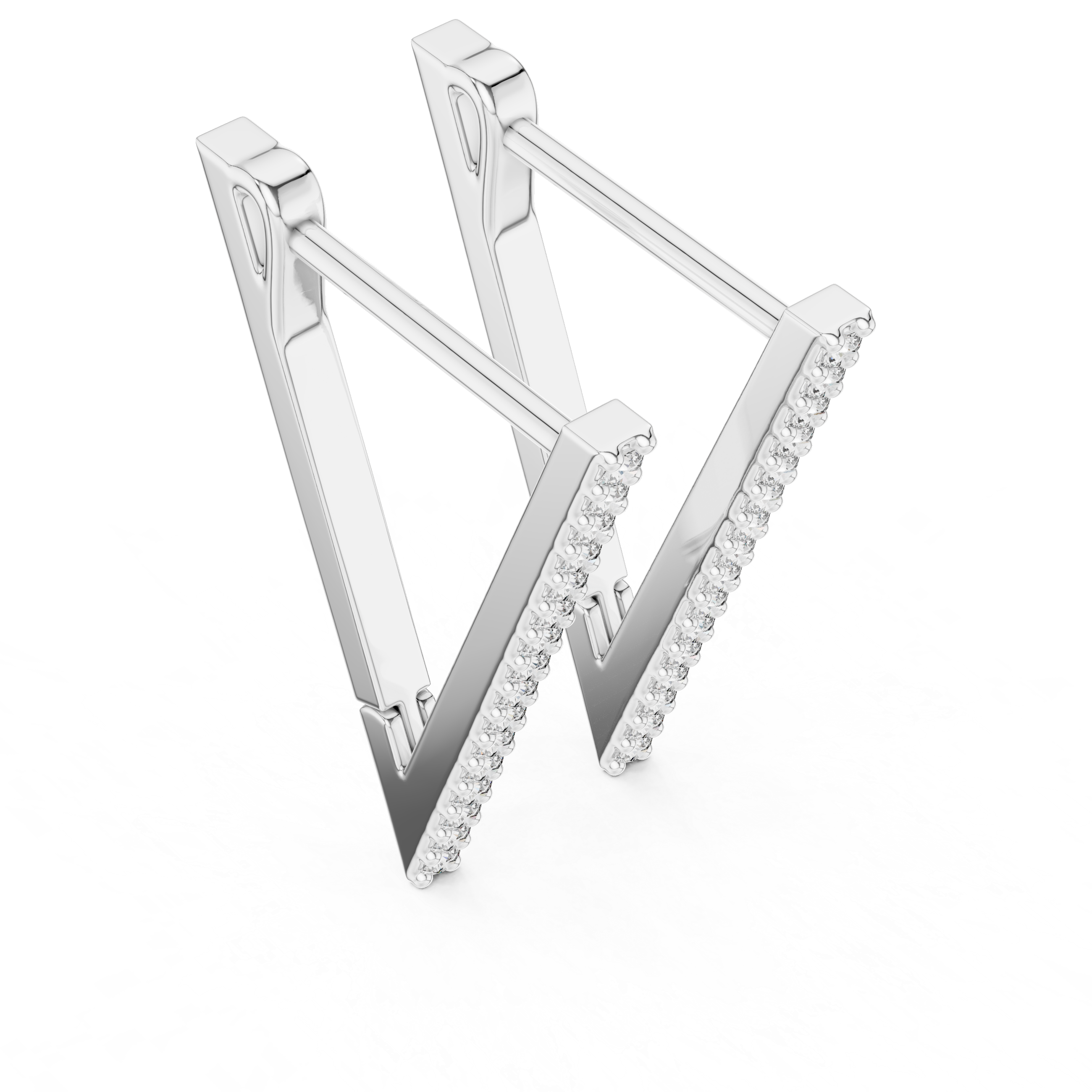 Silver earrings with clear stones on a white background