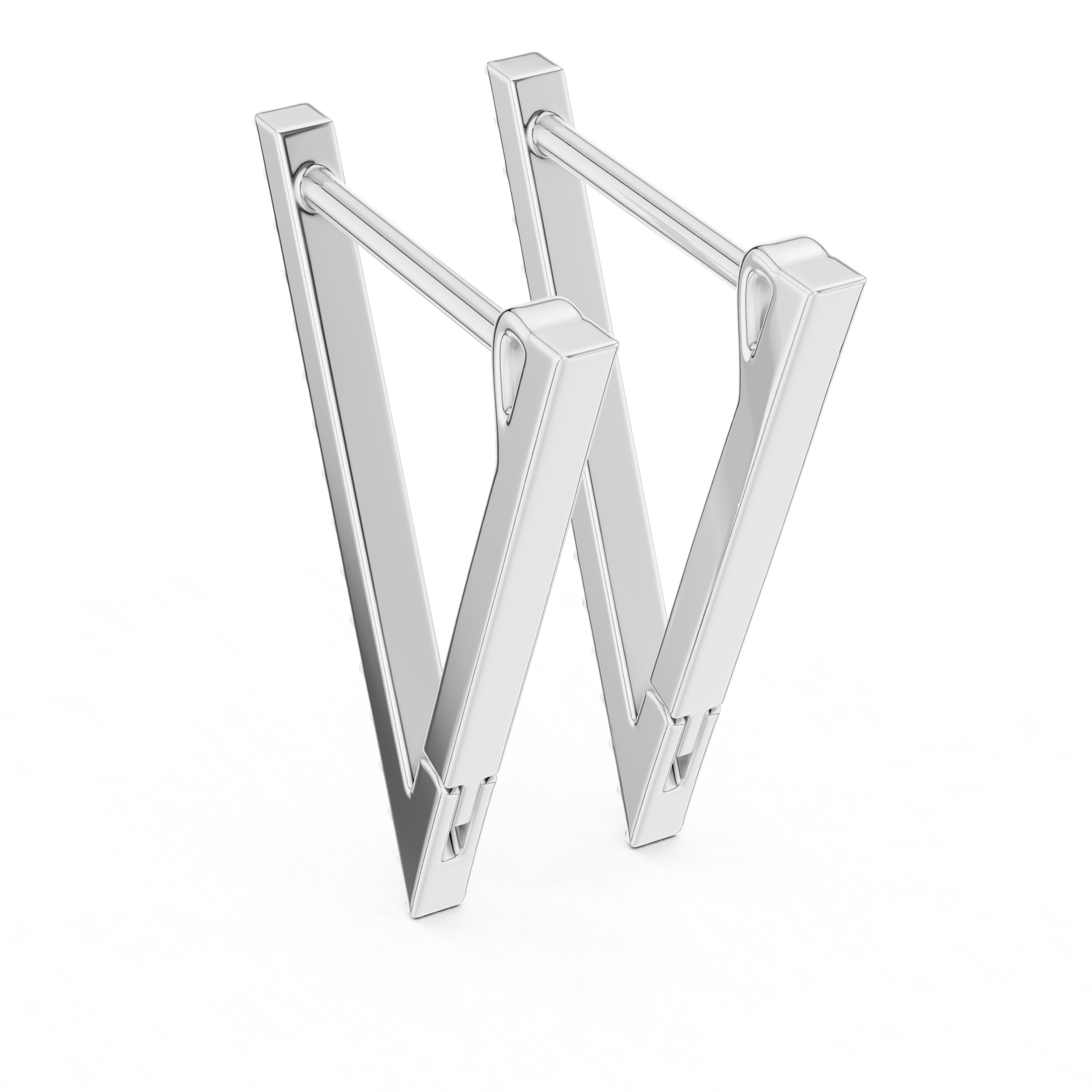 Silver geometric earrings on a white background