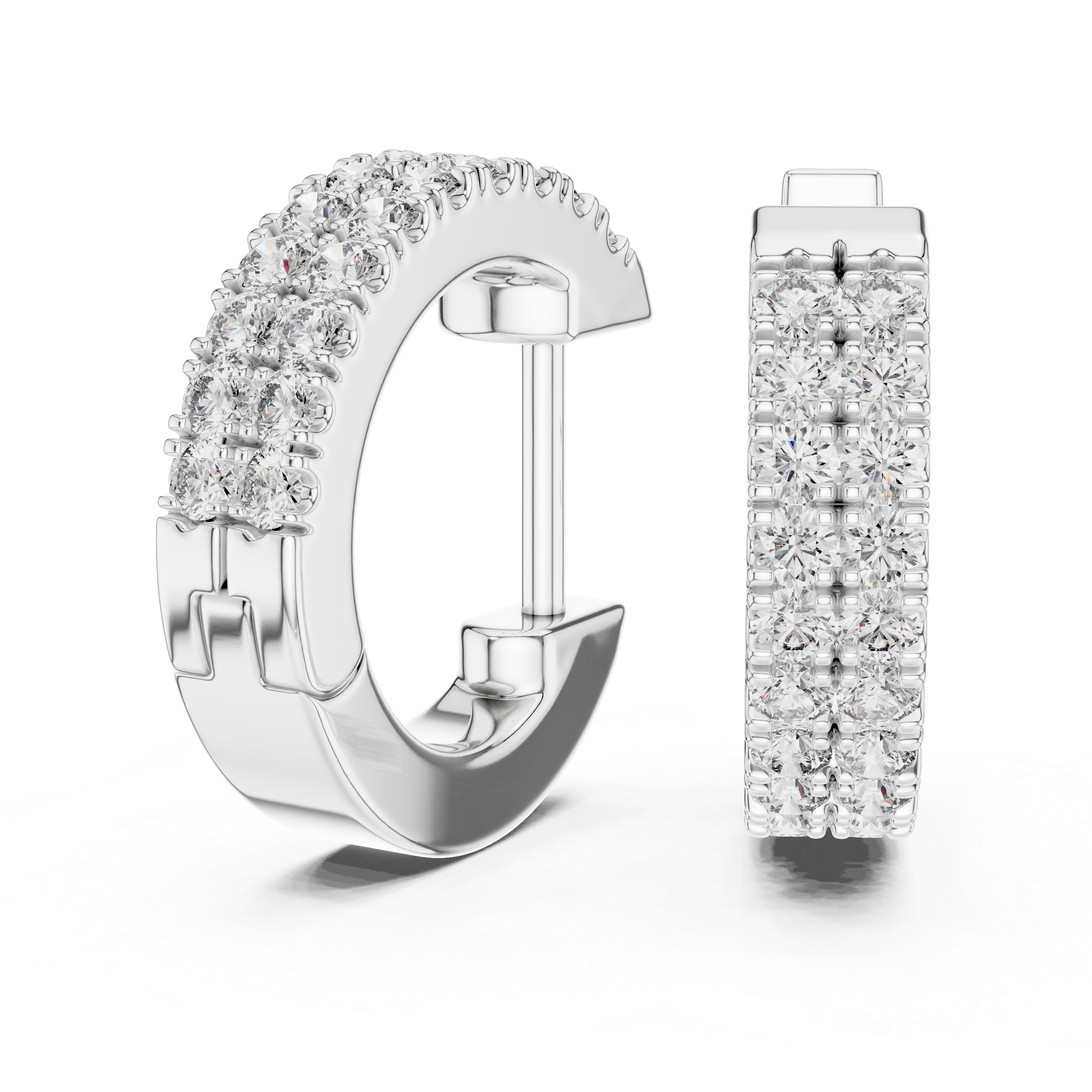 Silver hoop earrings with clear gemstones on a white background
