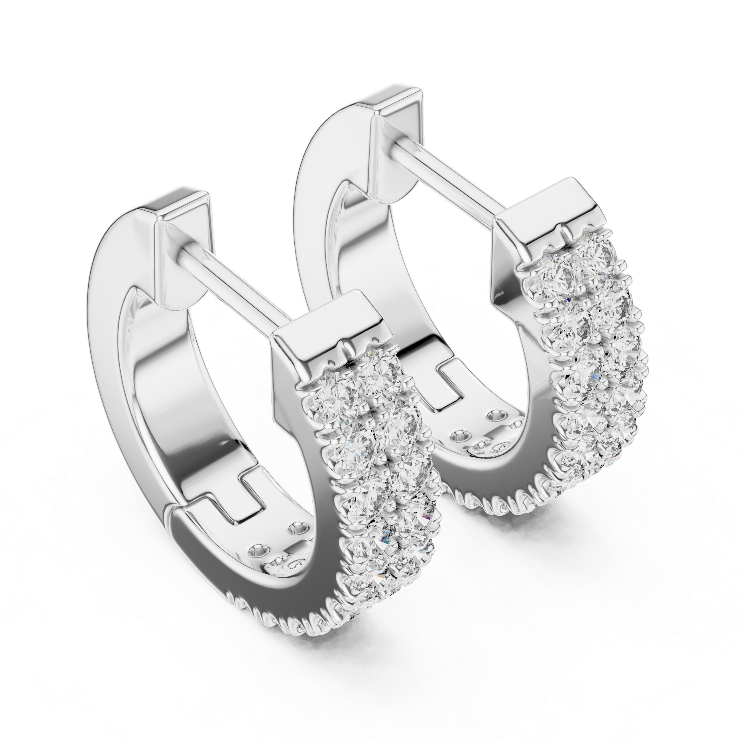 Silver hoop earrings with clear gemstones on a white background