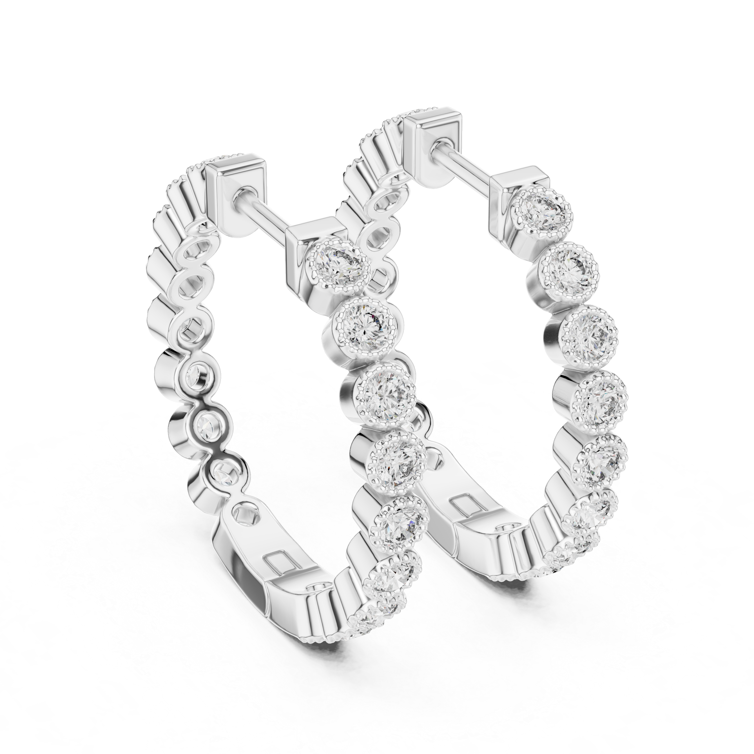 Pair of diamond hoop earrings on a white background