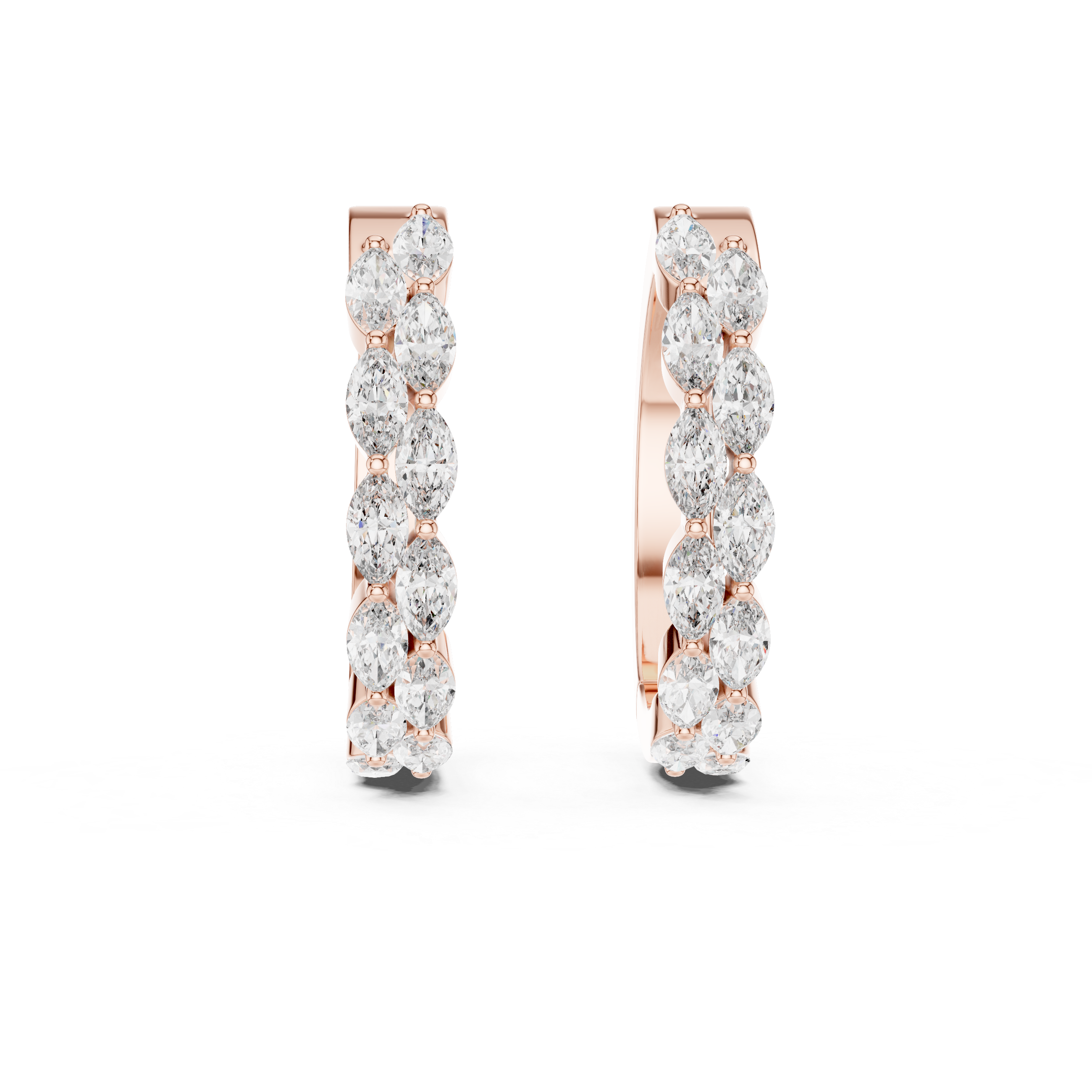 Rose gold hoop earrings with clear gemstones on a white background