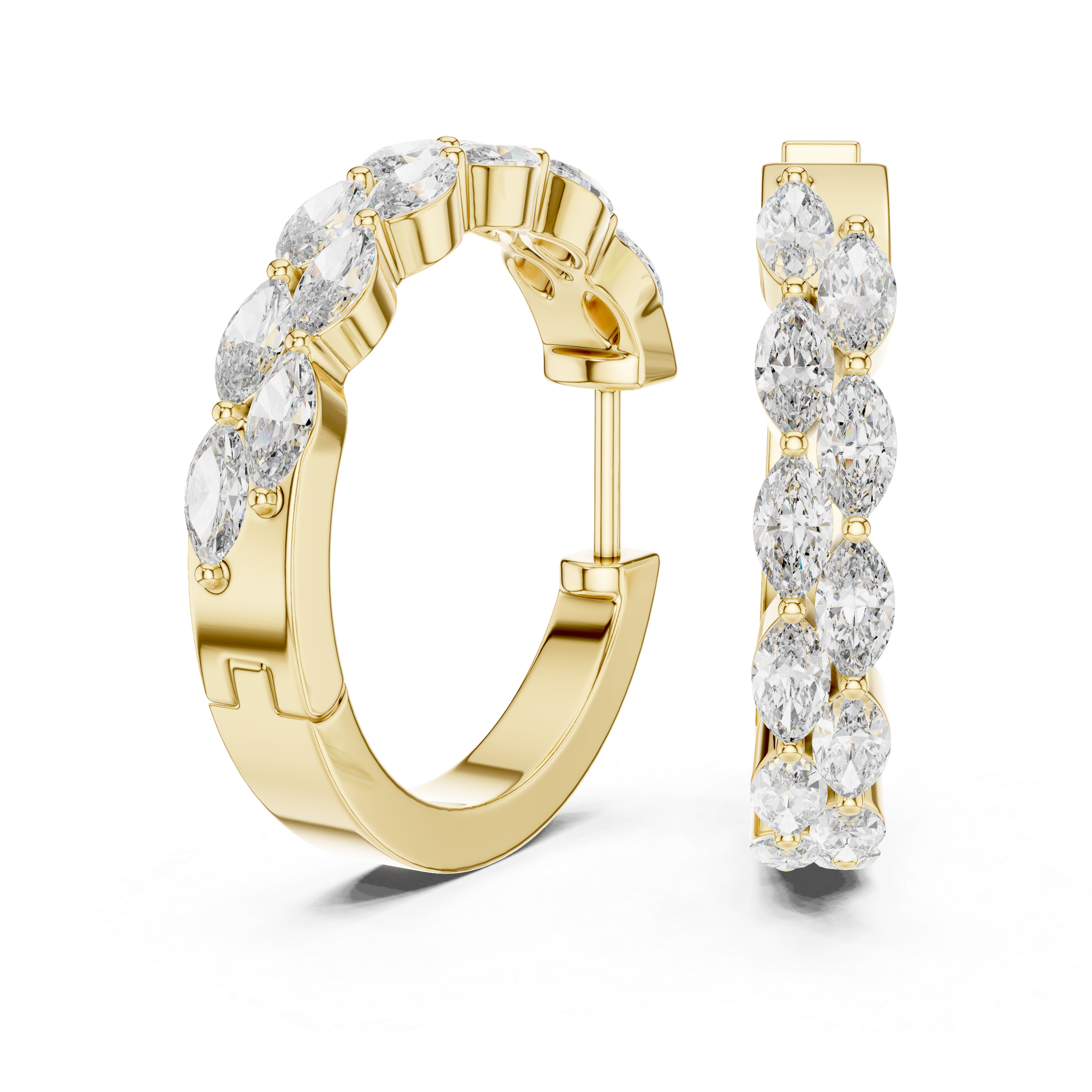 Gold hoop earrings with clear gemstones on a white background