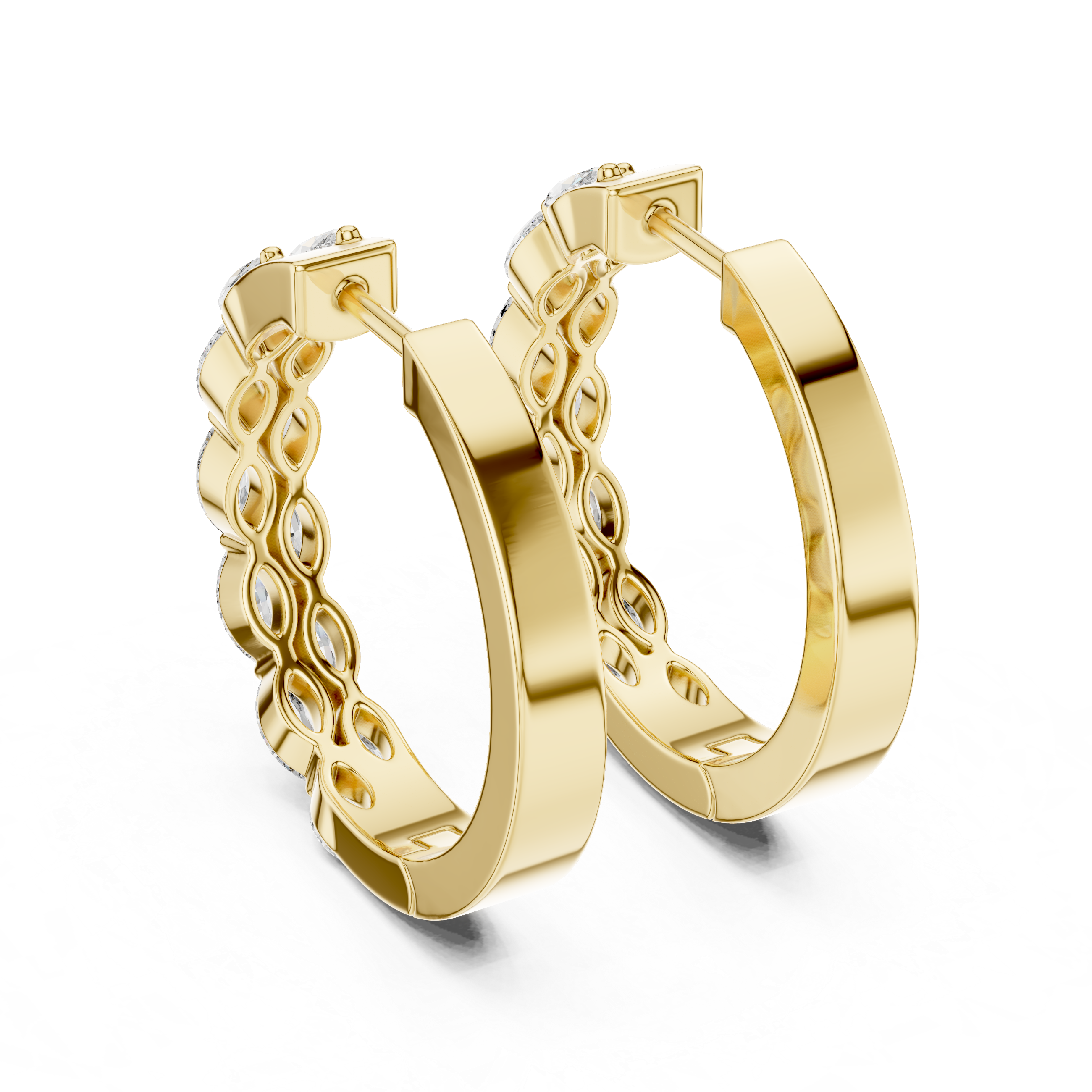 Gold hoop earrings with intricate design on a white background