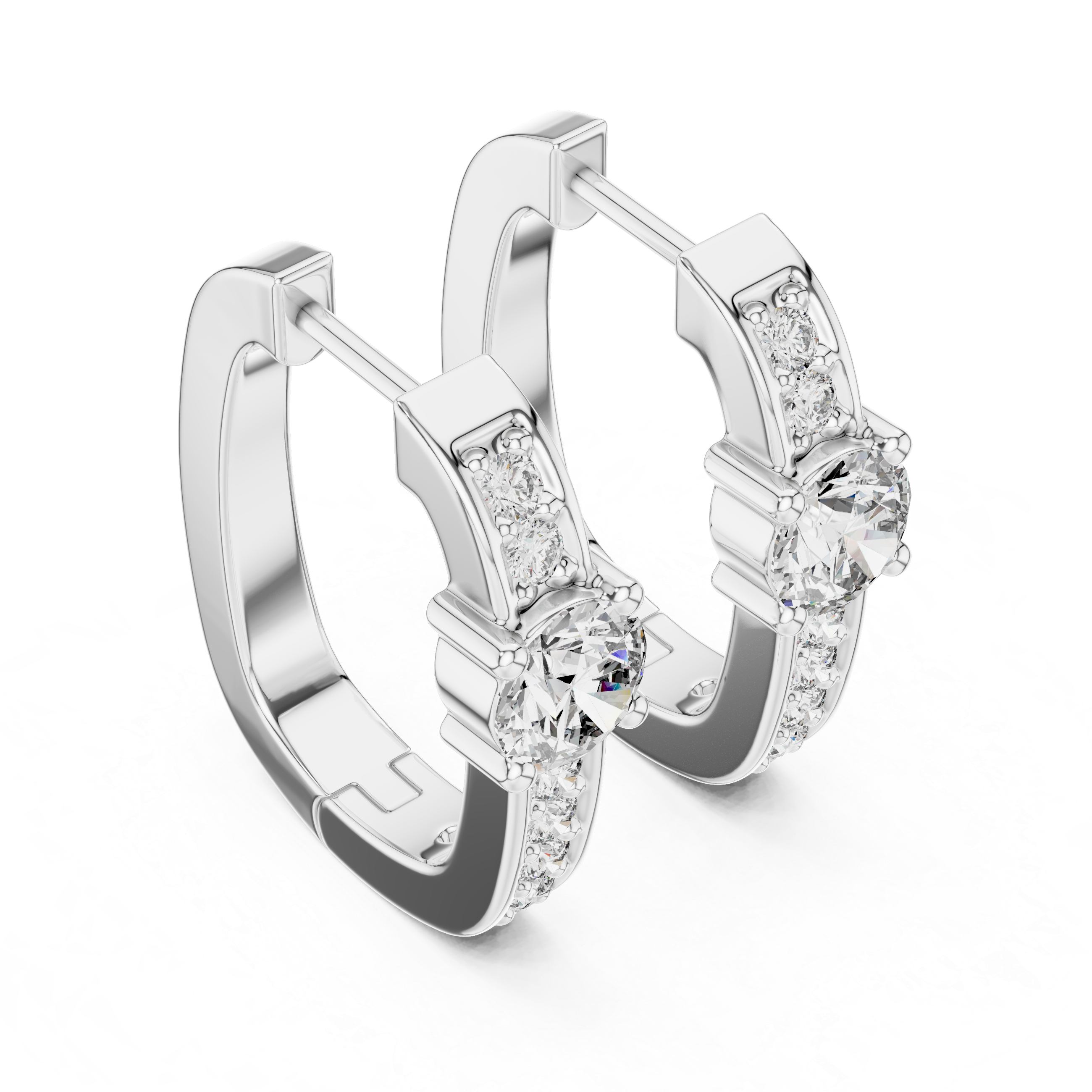 Silver hoop earrings with clear gemstones on a white background