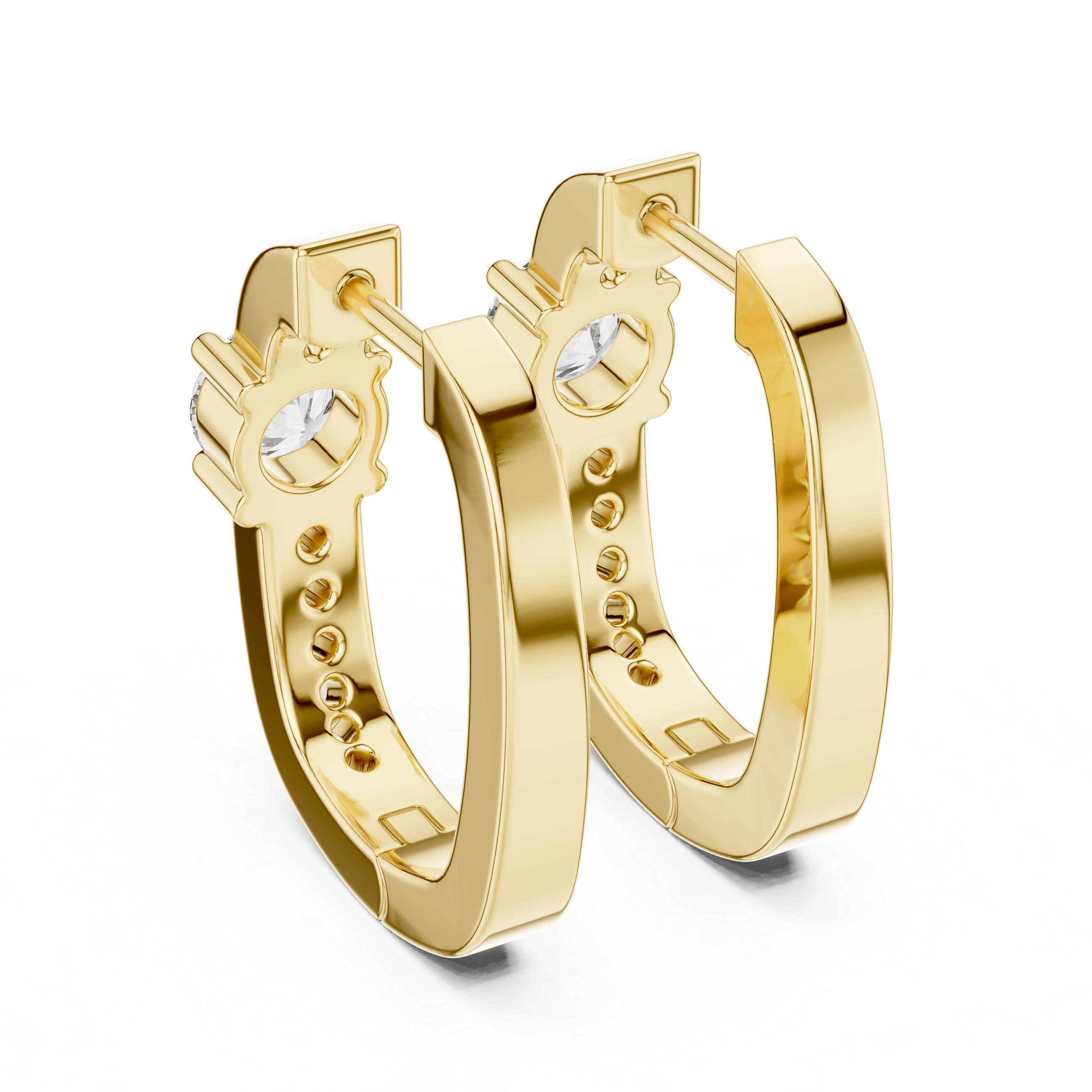 Gold hoop earrings with intricate designs on a white background
