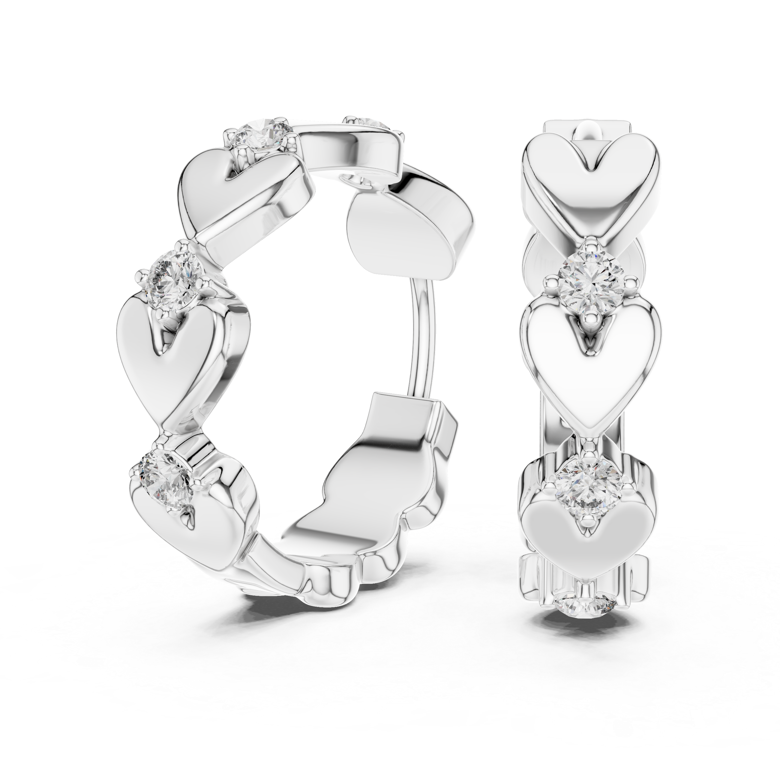 Silver hoop earrings with heart designs and clear gemstones on a white background