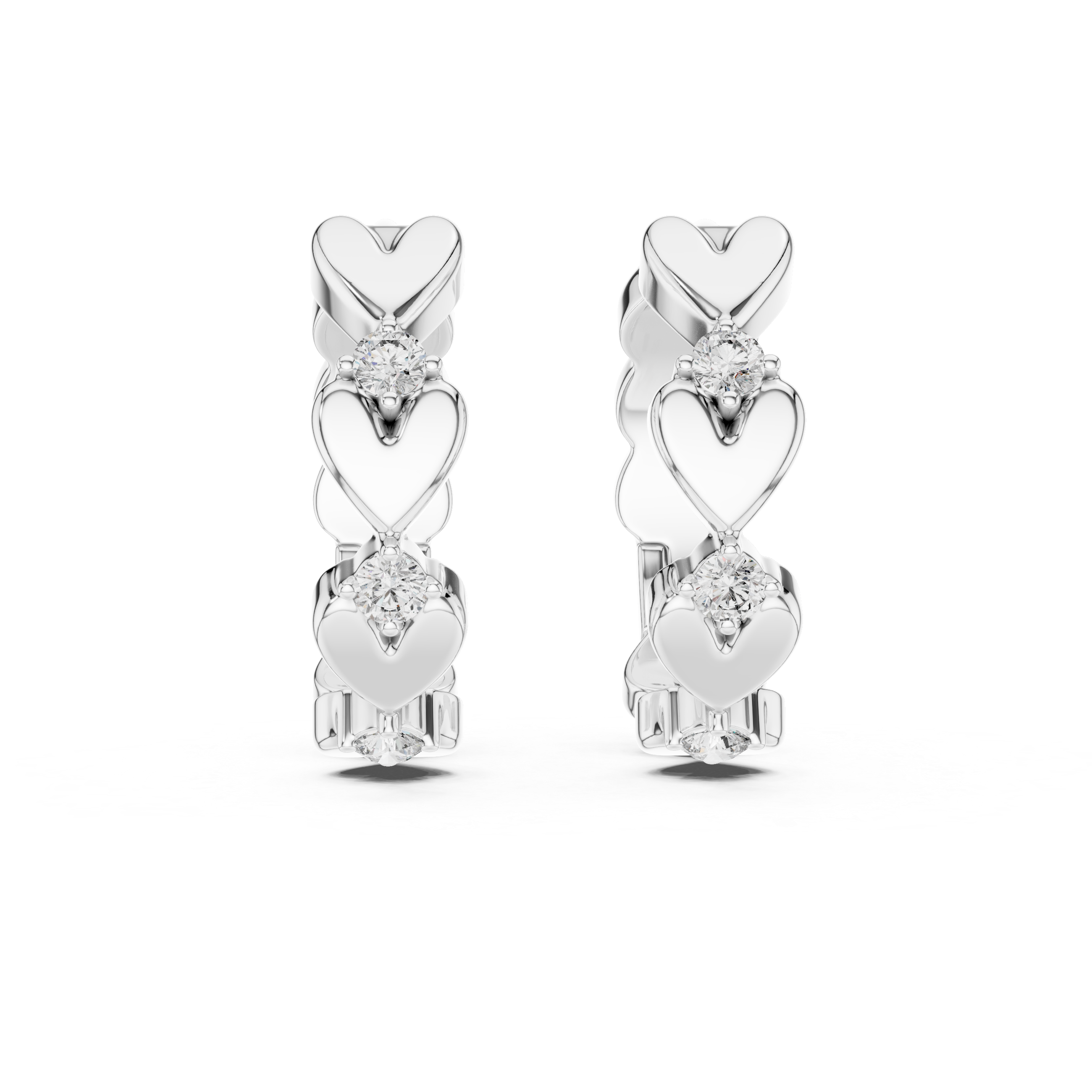 Pair of silver heart-shaped earrings with clear gemstones on a white background