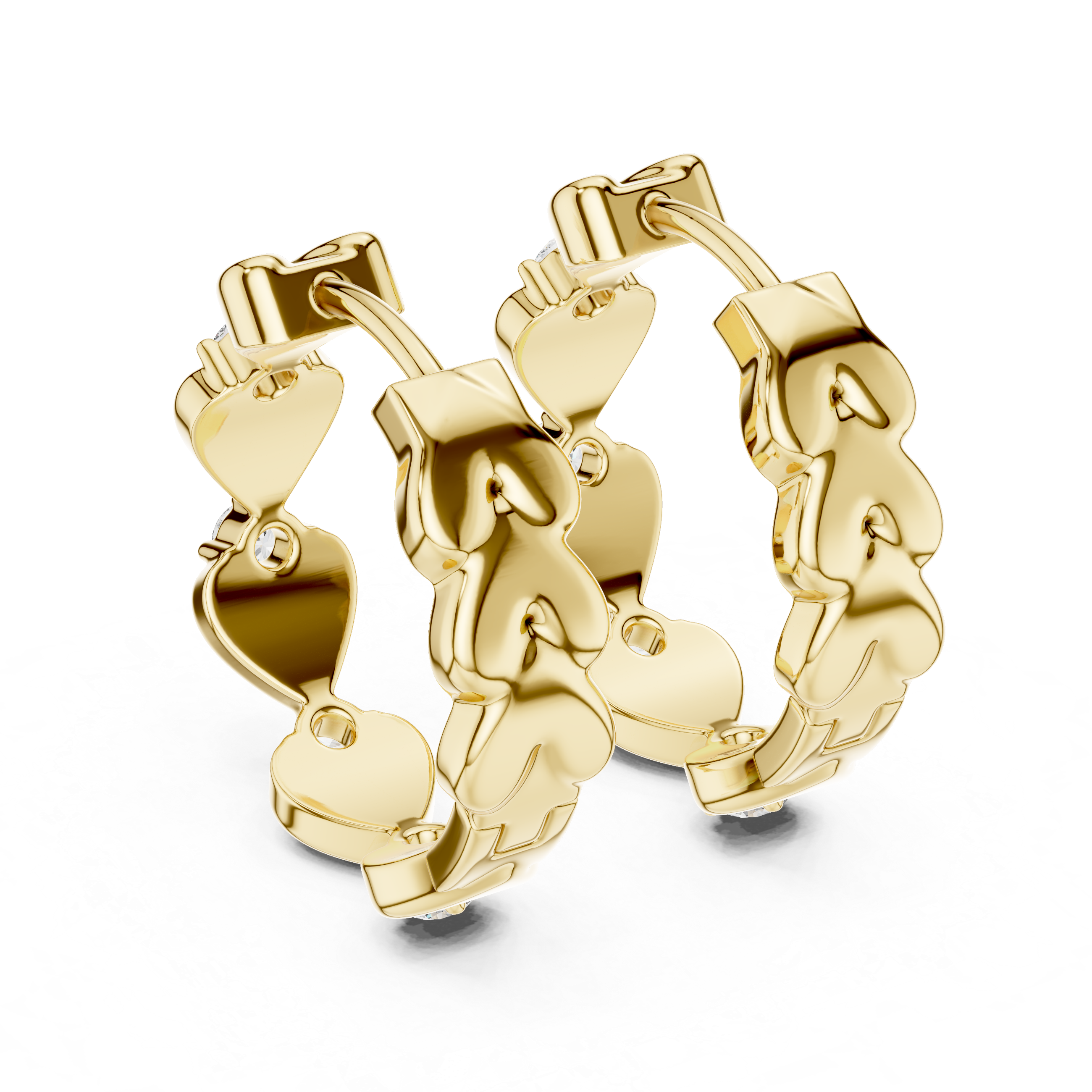 Gold hoop earrings with heart and apple designs on a white background