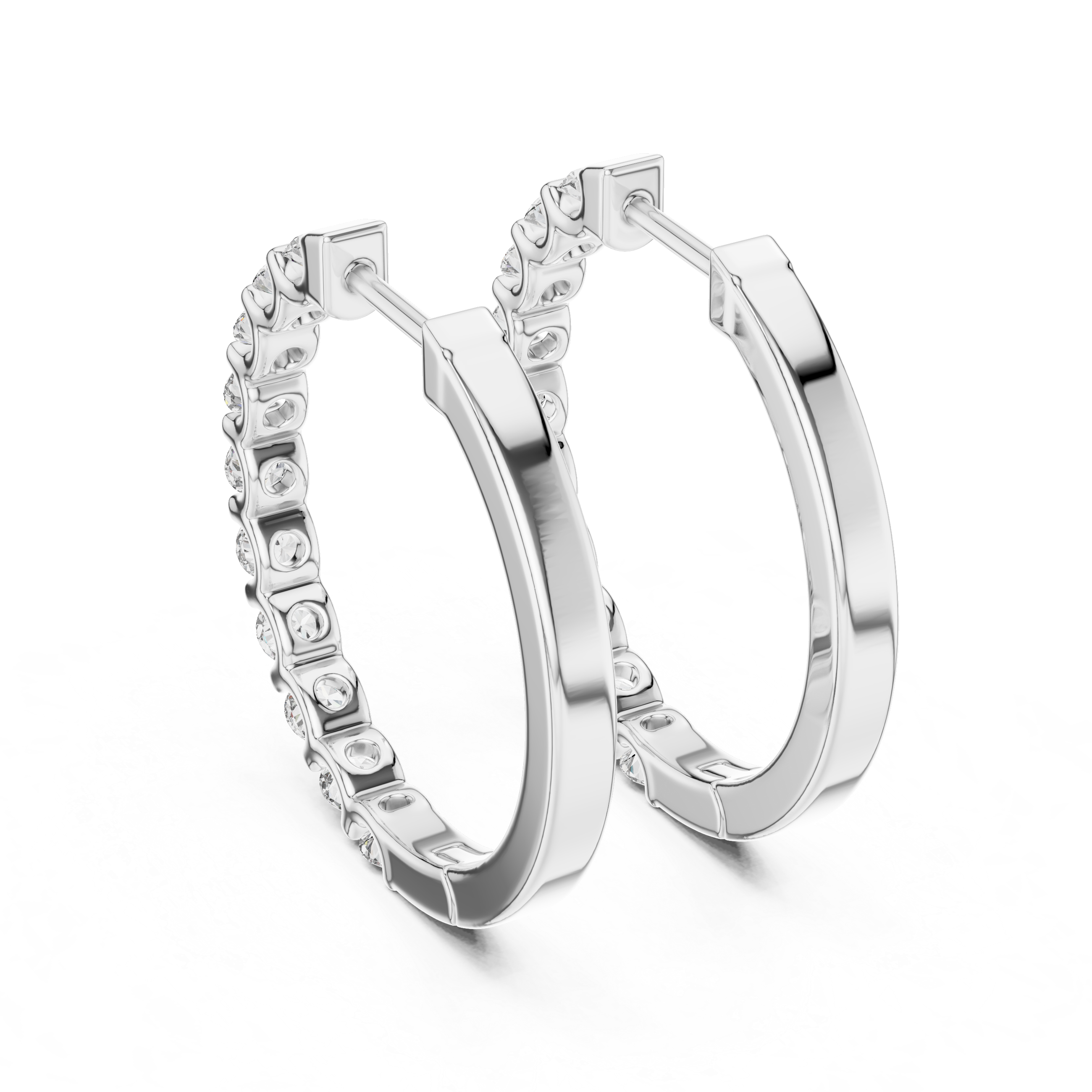 Silver hoop earrings with embedded stones on a white background