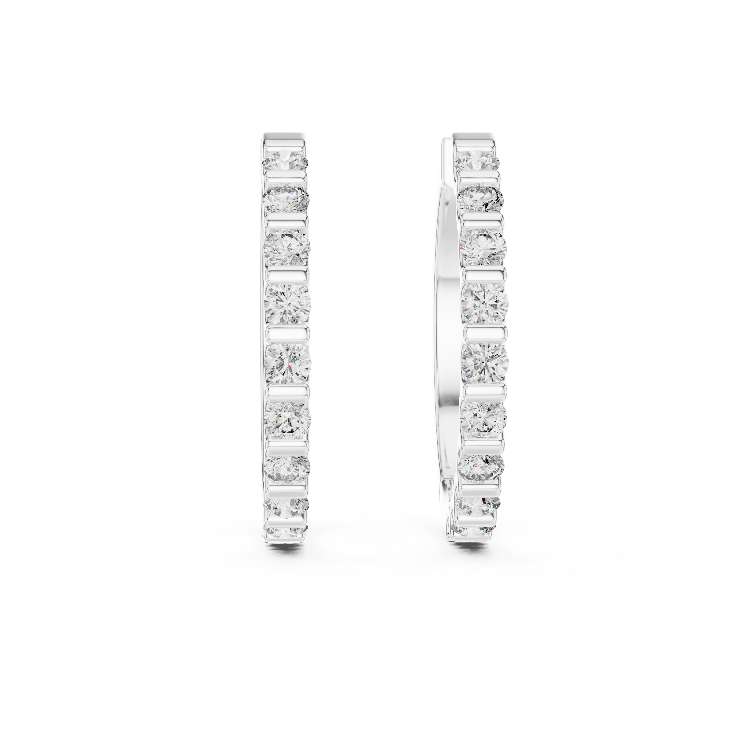 Pair of diamond hoop earrings on a white background