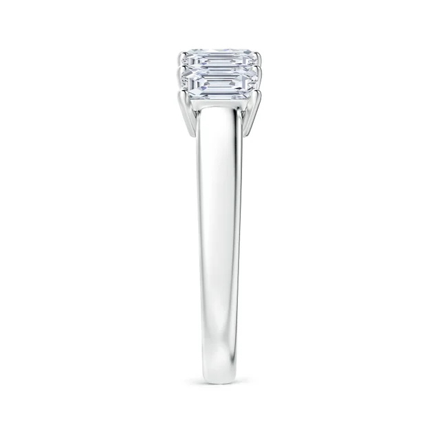 Silver ring with a rectangular gemstone on a white background