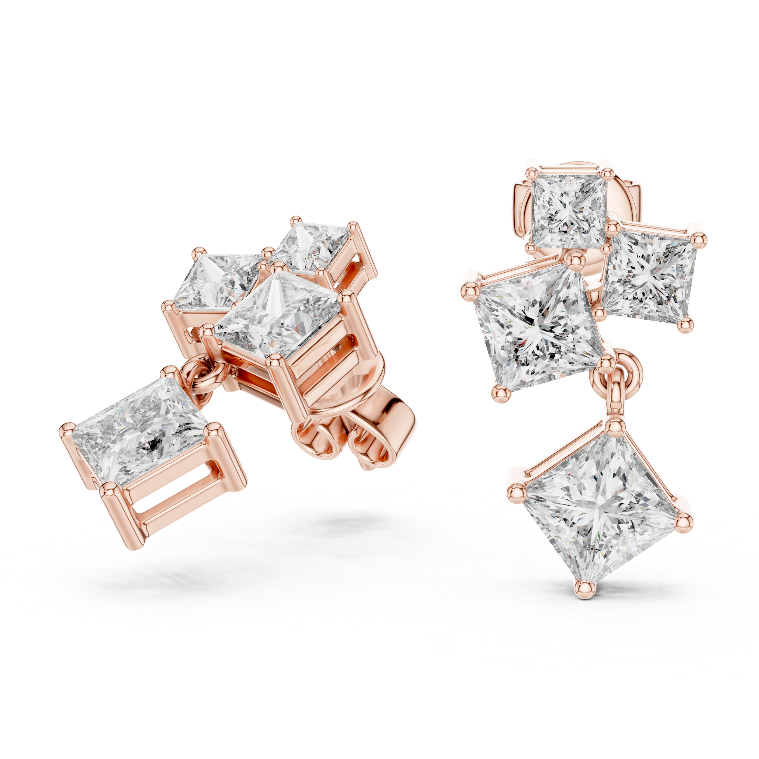 Rose gold earrings with clear gemstones on a white background