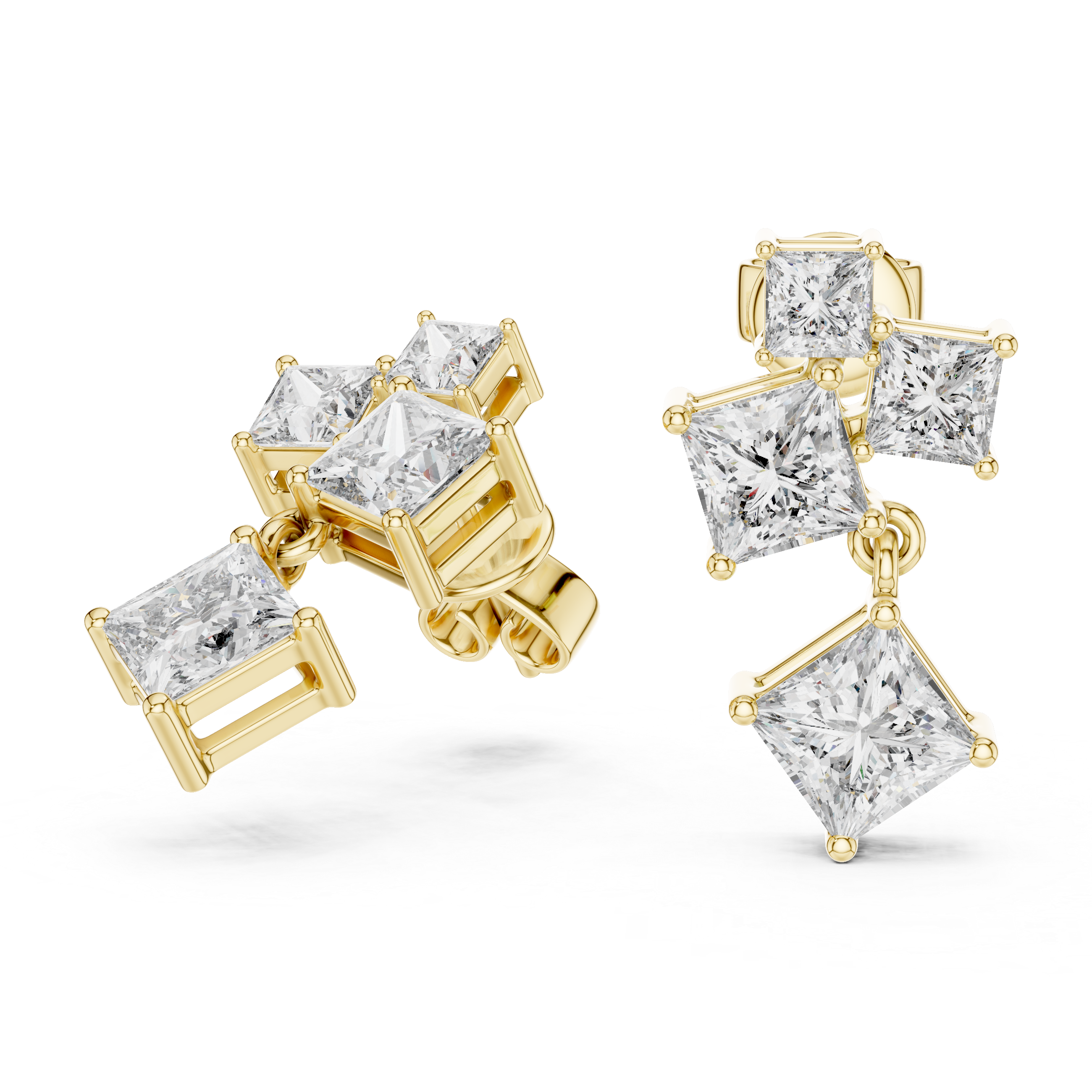 Gold earrings with clear gemstones on a white background