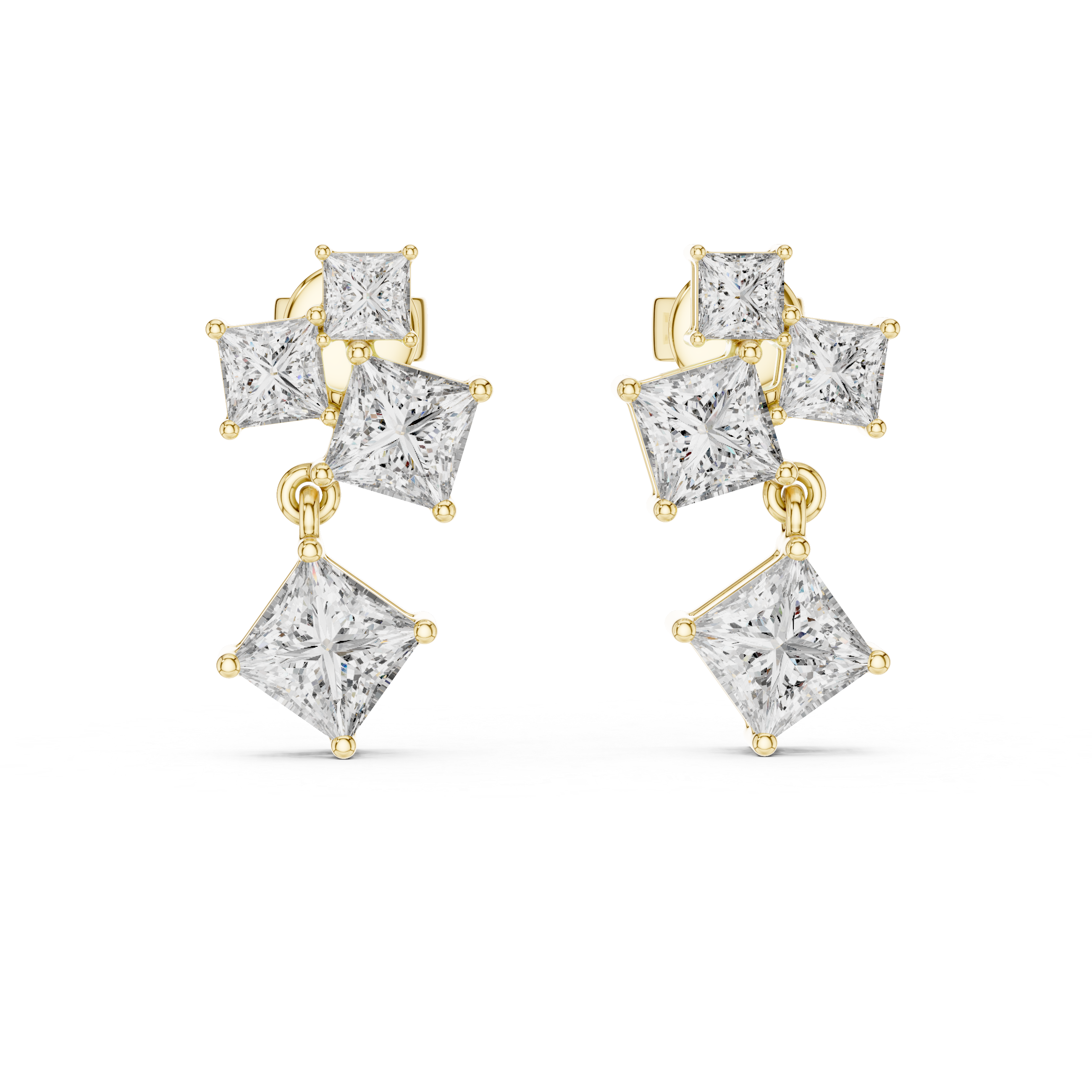 Gold and diamond earrings on a white background