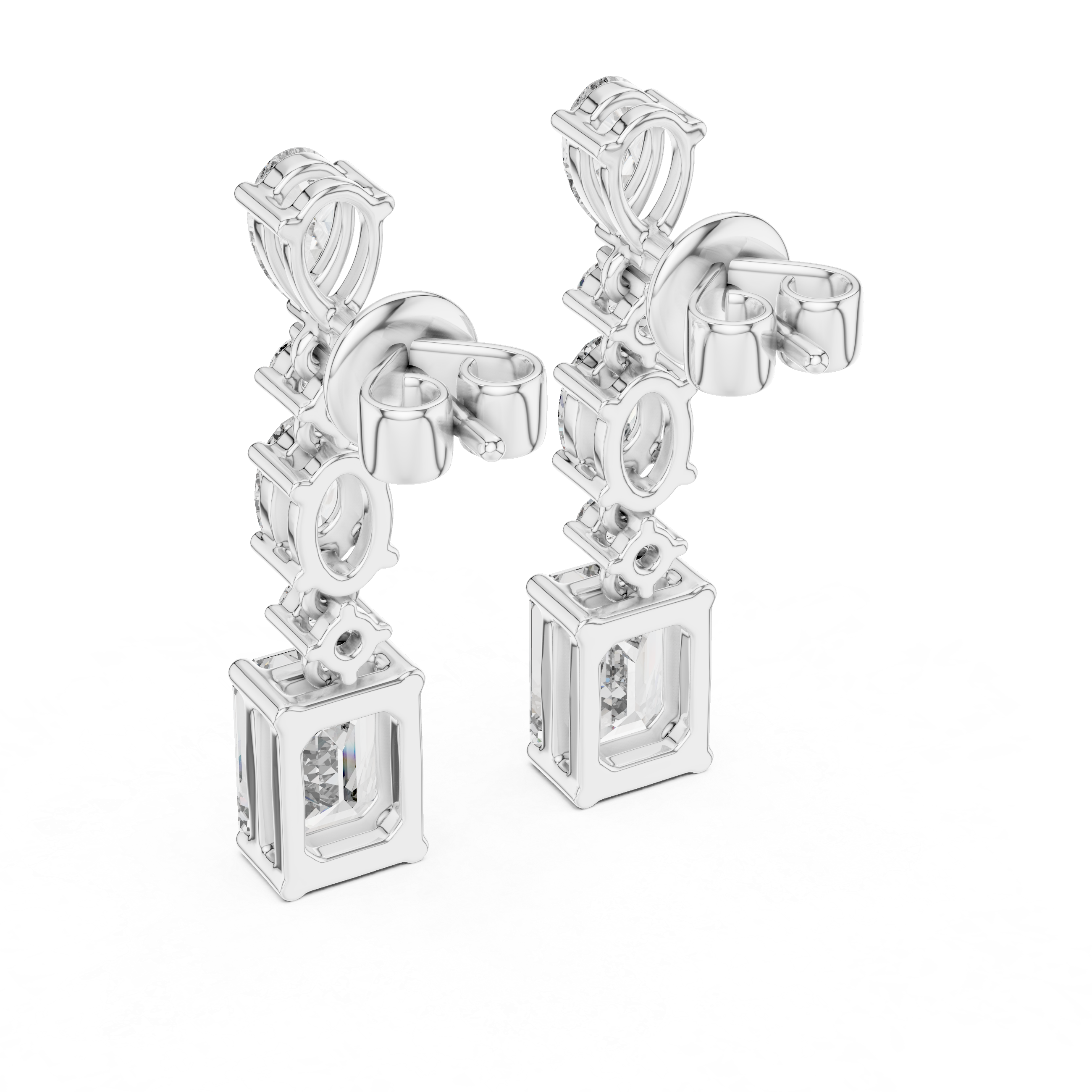 Pair of silver earrings with rectangular and heart-shaped gemstones on a white background