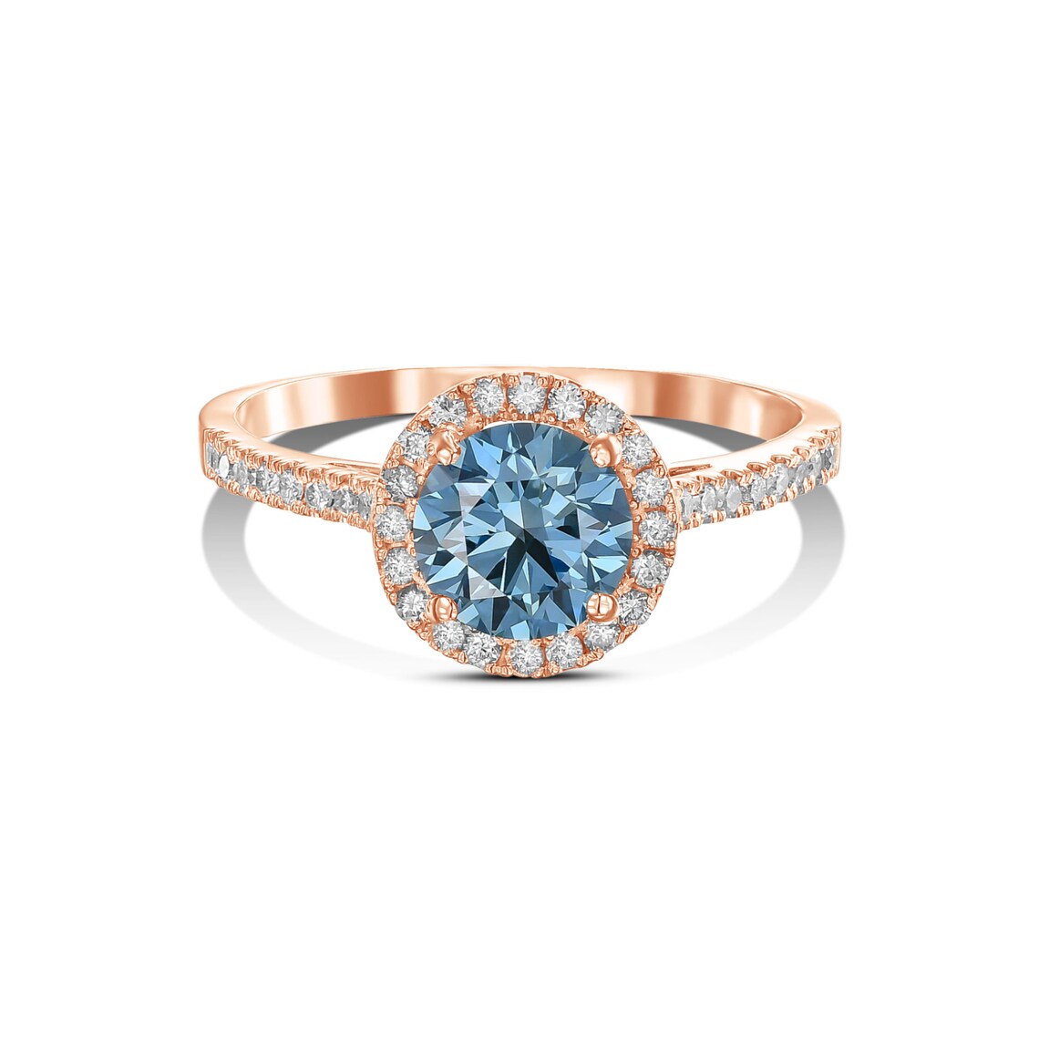 Rose gold ring with a blue gemstone and diamond accents on a white background