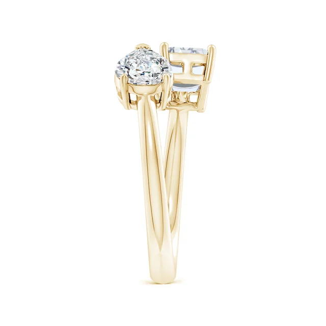 Gold ring with a diamond on a white background