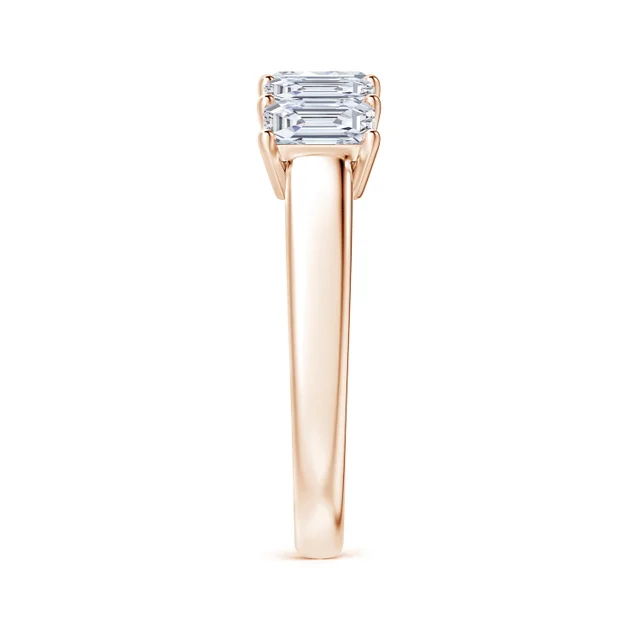 Rose gold ring with a diamond on a white background